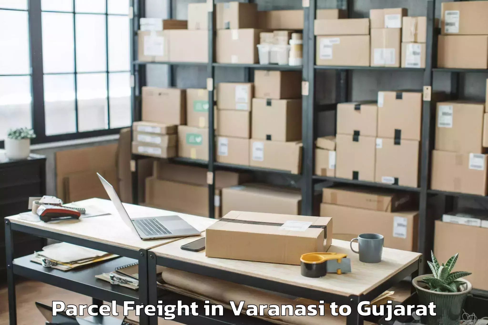 Professional Varanasi to Bhanvad Parcel Freight